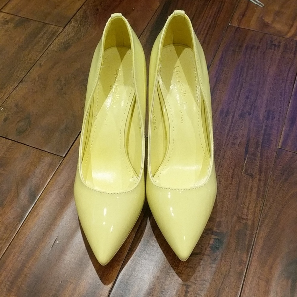 Red bottom Yellow pumps